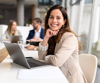 Smiling Woman with Laptop